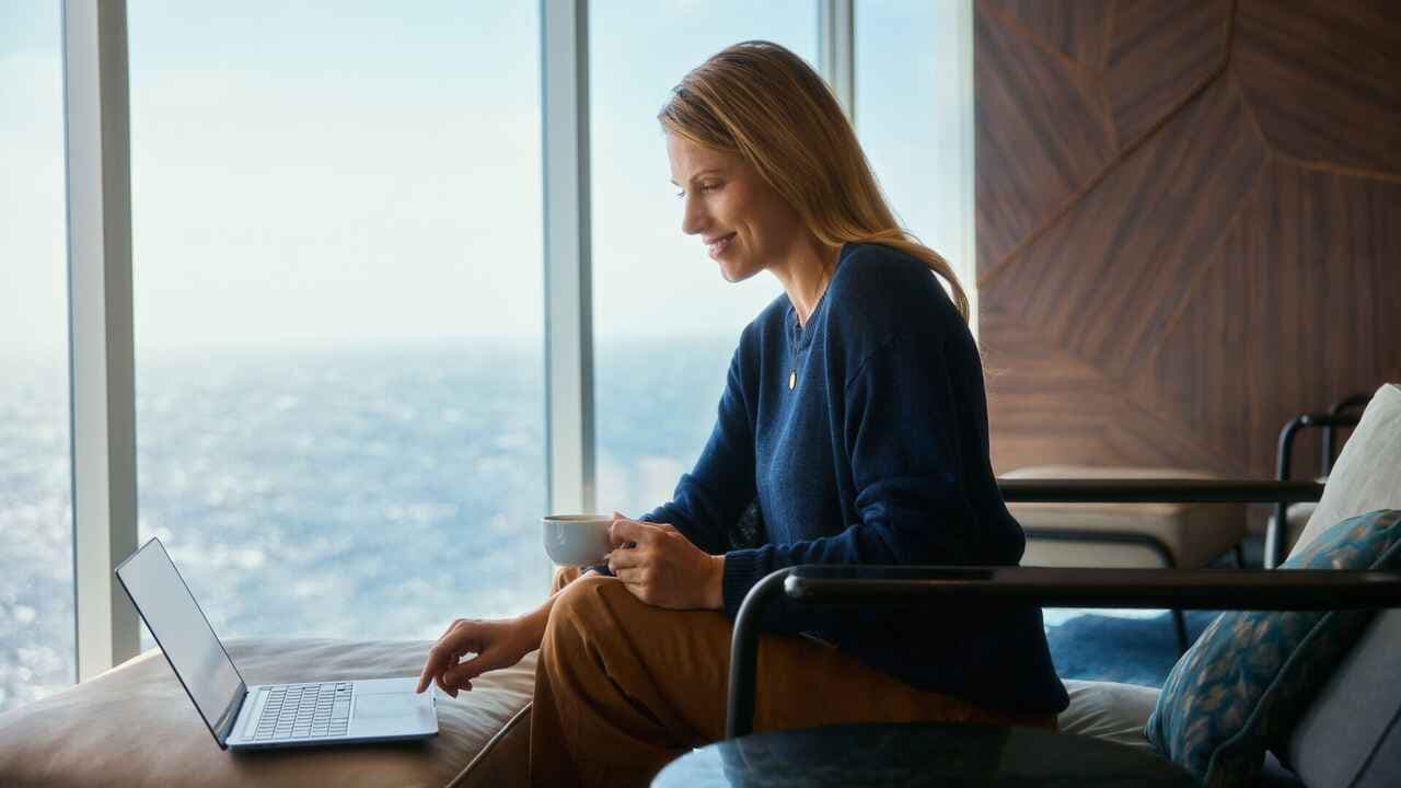 Woman browsing on a laptop